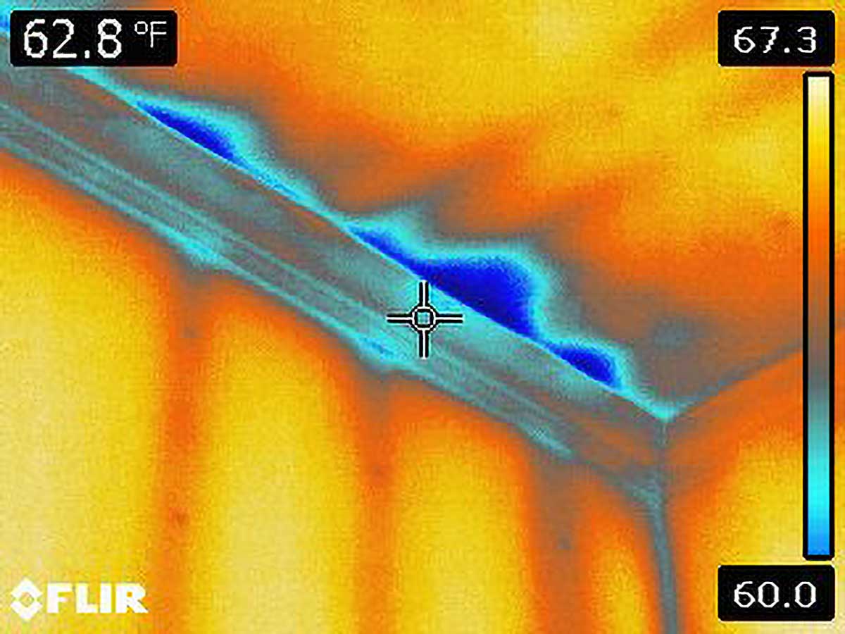 Roof consultants using a Flir E60bx Infrared Camera.