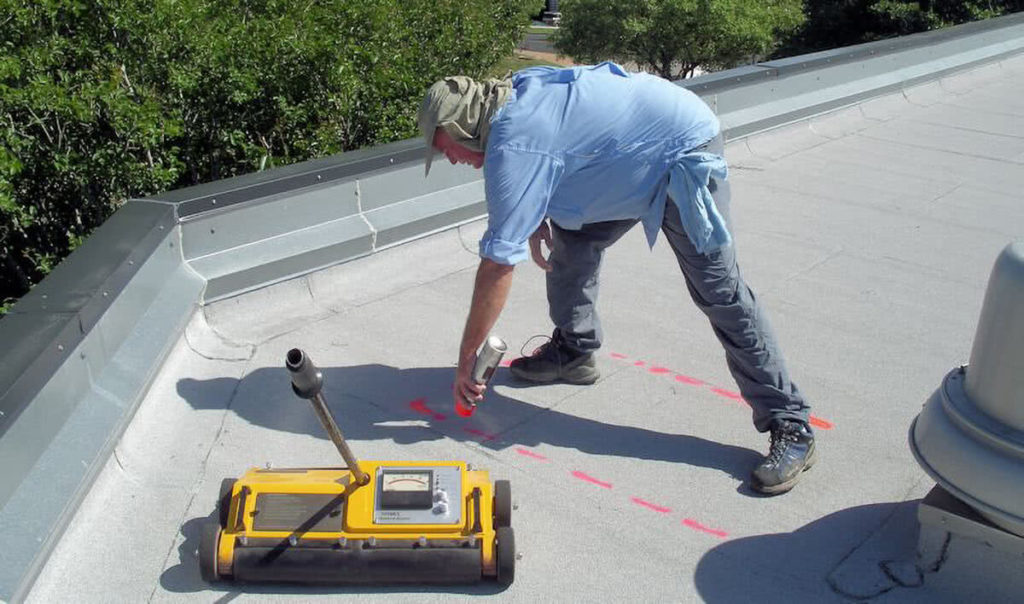 Roof consultant uses Roofscan to test for leaks.