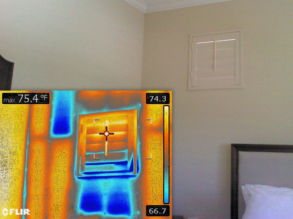 Home energy audit using thermal imaging to detect leaks.
